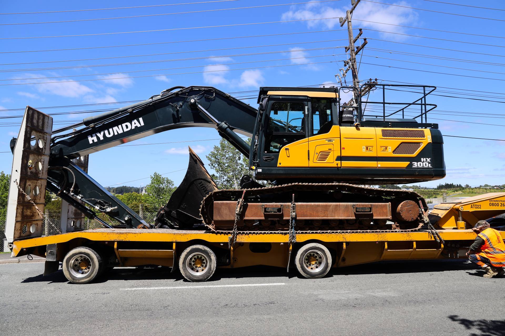 Hyundai 30T ton GPS Digger Excavator for hire from Pronto Hire Auckland on transport truck